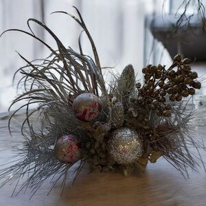 Elegant Silver and Red Holiday Decor with Pinecones